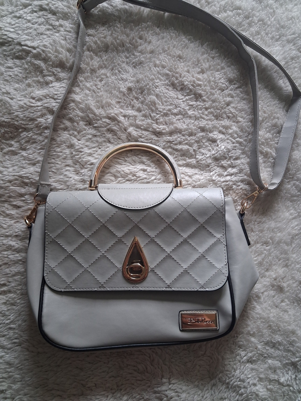 Elegant Quilted White Top-Handle Crossbody Bag with Gold Accent